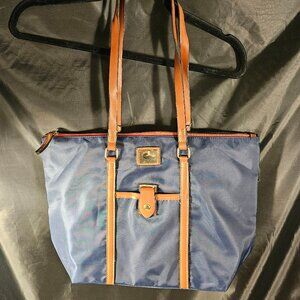 Dooney & Bourke navy vinyl and leather tote bag with matching pouch.